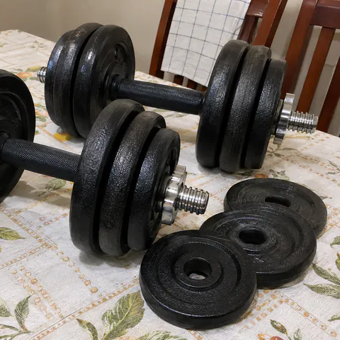 Foto do produto Par de halteres ajustáveis com anilhas disponível para troca no Unitrocas