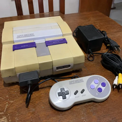 Foto do produto Super Nintendo Baby com controle e cabos disponível para troca no Unitrocas